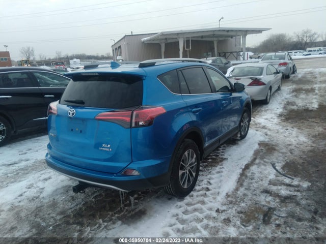 2018 Toyota RAV4, VIN: JTMRJREV2JD211532