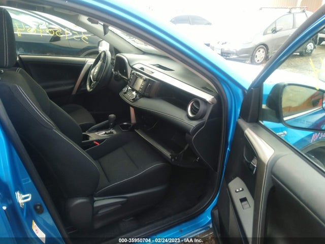 2018 Toyota RAV4, VIN: JTMRJREV2JD211532