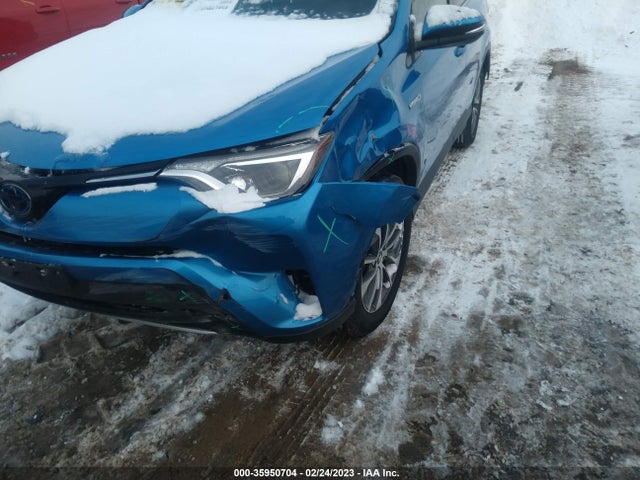 2018 Toyota RAV4, VIN: JTMRJREV2JD211532