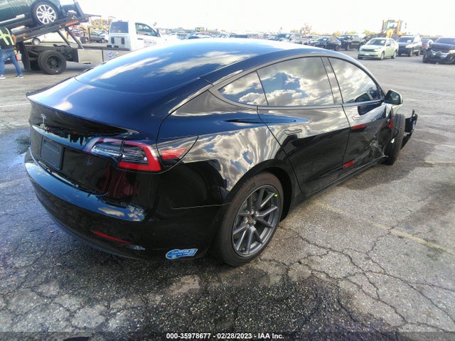 Tesla Model 3 Standard Range Plus 2021 5YJ3E1EA9MF870651 Image 4