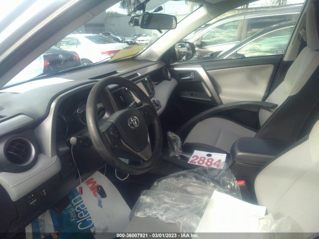 2016 Toyota RAV4, VIN: JTMRJREV0GD051787
