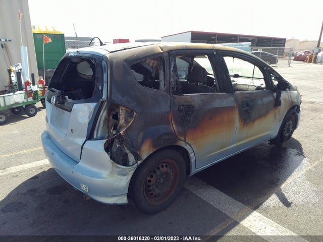 2009 HONDA FIT VIN: JHMGE88249S021857