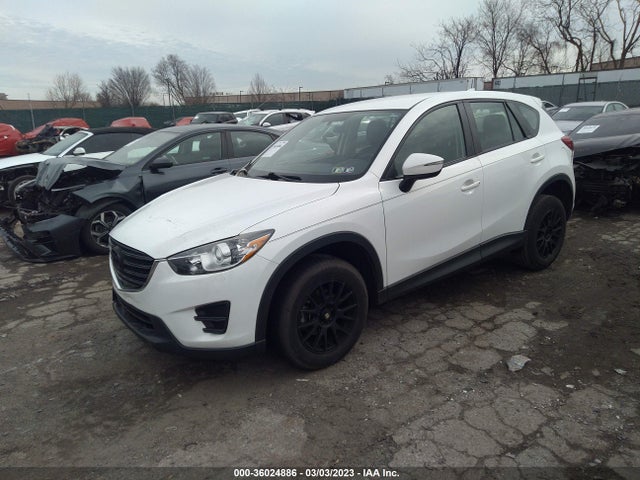 2016 MAZDA CX-5 SPORT VIN: JM3KE4BYXG0765707