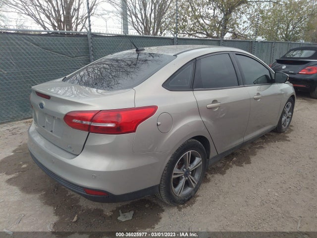 2016 Ford Focus, VIN: 1FADP3FE4GL404709
