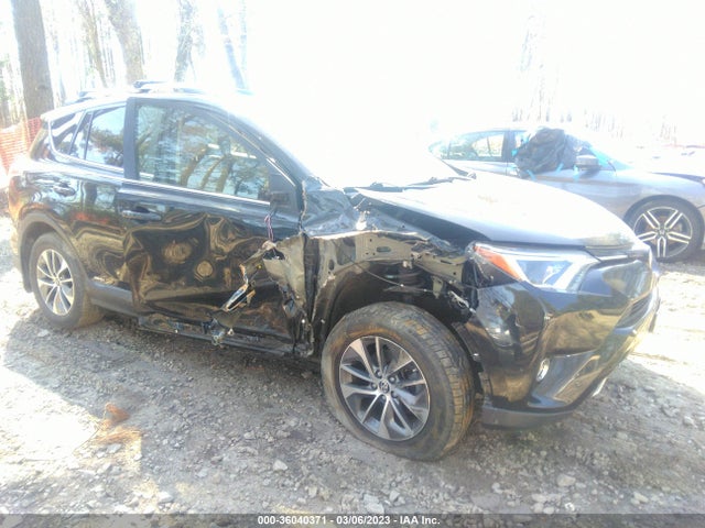 2016 Toyota RAV4, VIN: JTMRJREV2GD039933