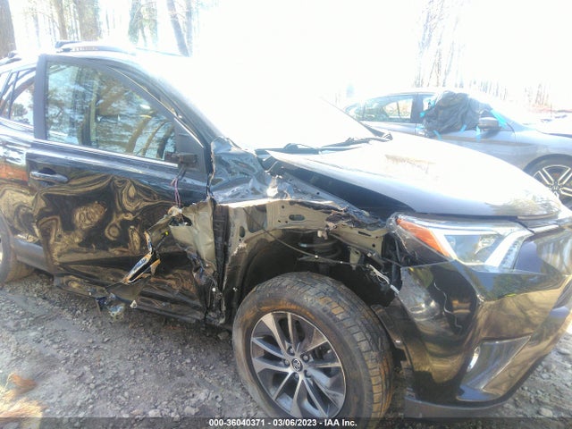 2016 Toyota RAV4, VIN: JTMRJREV2GD039933