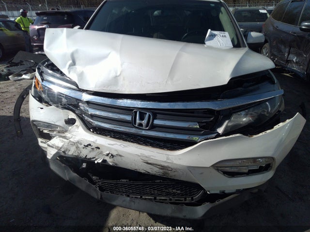 2018 HONDA PILOT EX-L VIN: 5FNYF5H57JB023017