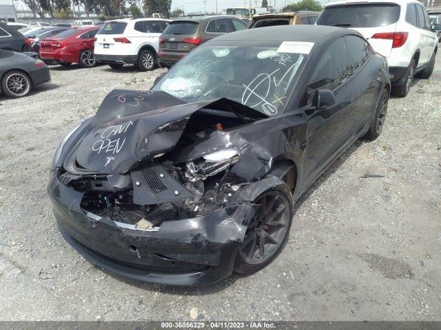 Tesla Model 3 Standard Range Plus 2021 5YJ3E1EA2MF031103 Image 2