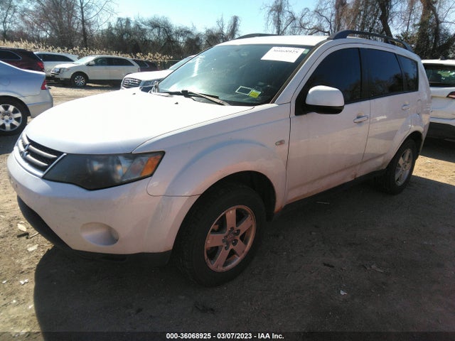 JA4LT21WX8Z006537 Mitsubishi Outlander Es