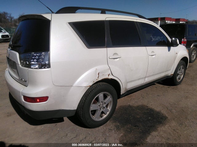 JA4LT21WX8Z006537 Mitsubishi Outlander Es