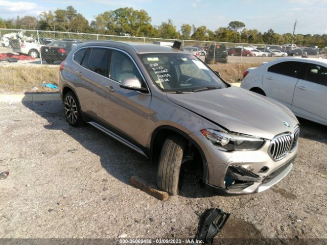 WBXJG7C04M5S51281 auction archive image