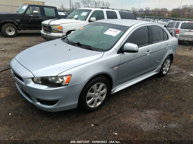 JA32U2FUXDU020790 Mitsubishi LANCER ES