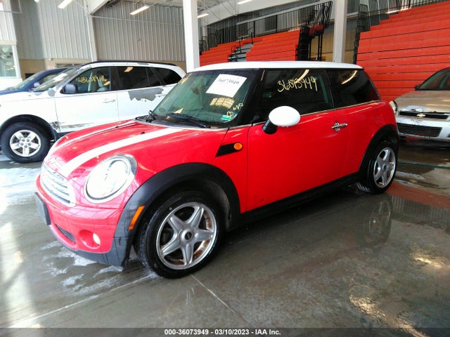 2010 MINI COOPER HARDTOP VIN: WMWMF3C55ATU77612
