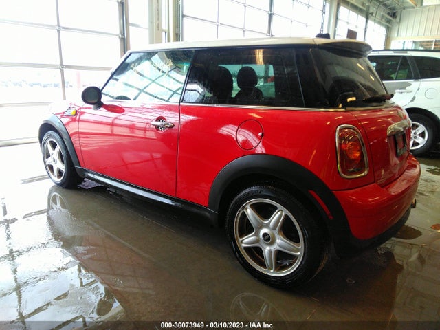 2010 MINI COOPER HARDTOP VIN: WMWMF3C55ATU77612