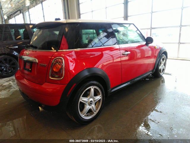 2010 MINI COOPER HARDTOP VIN: WMWMF3C55ATU77612