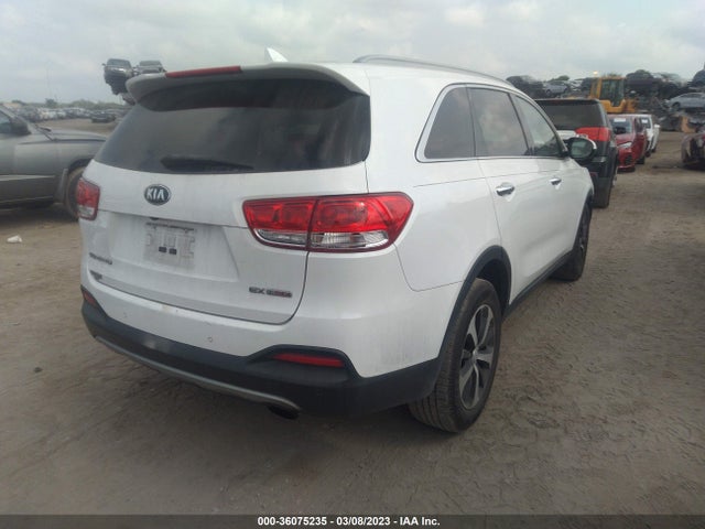 2016 KIA SORENTO EX VIN: 5XYPH4A13GG018857