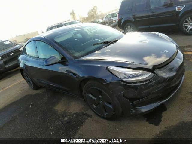Tesla Model 3 Standard Range Plus 2021 5YJ3E1EA0MF875981 Image 1