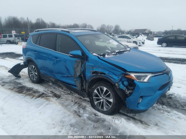 2016 Toyota RAV4, VIN: JTMRJREV9GD058415