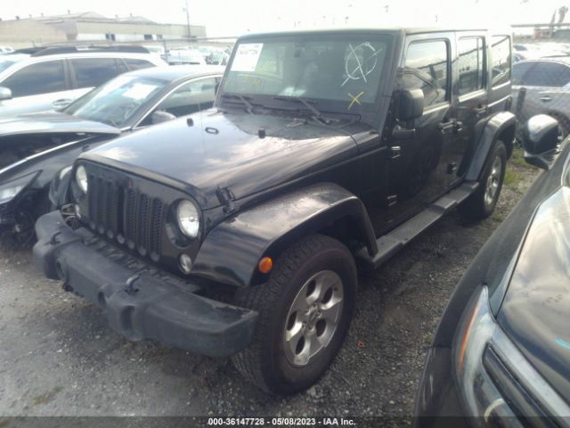 1C4HJWEG0EL119407 Jeep Wrangler Unlimited Sahara