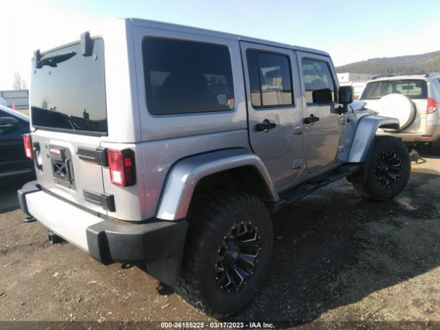 1C4BJWEG4EL101563 Jeep Wrangler Unlimited Sahara