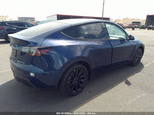 Tesla Model Y Long Range 2023 7SAYGDEE6PF639198 Image 4