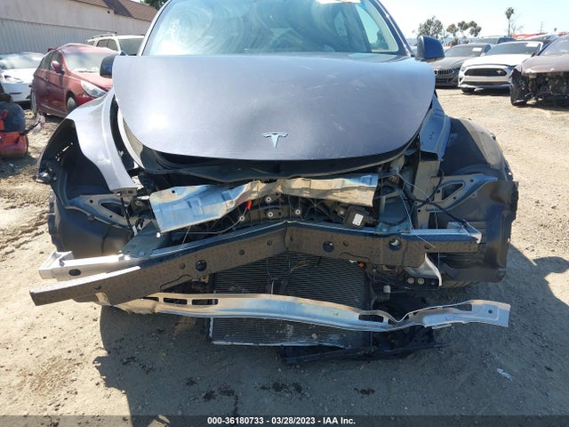 2021 Tesla Model Y, VIN: 5YJYGDEE3MF299792