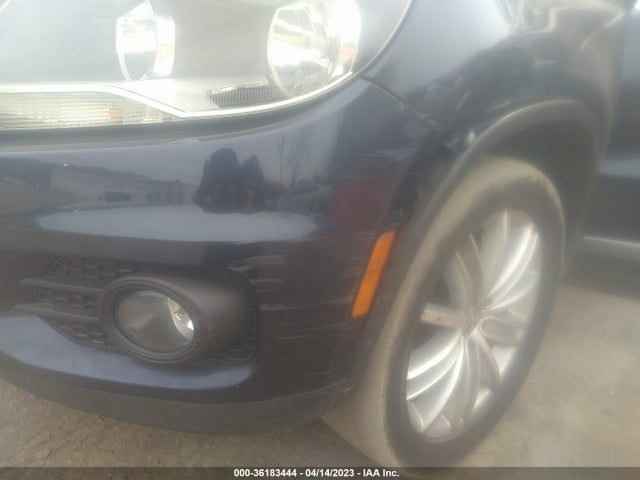 2014 VOLKSWAGEN TIGUAN SEL VIN: WVGBV3AX1EW554395