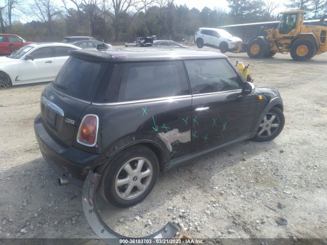 2010 MINI COOPER HARDTOP VIN: WMWMF3C59ATZ62612