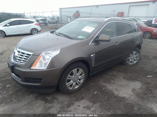 2014 CADILLAC SRX LUXURY COLLECTION VIN: 3GYFNEE30ES577925
