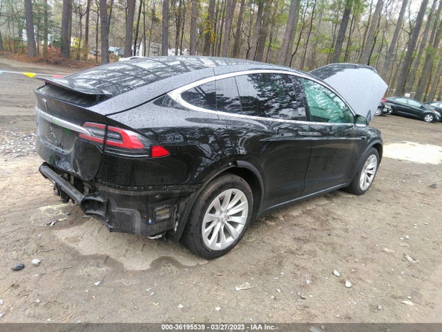 2021 Tesla Model X, VIN: 5YJXCBE26MF323567