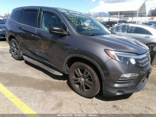 Honda PILOT LX 2018 5FNYF5H10JB009005 Image 1