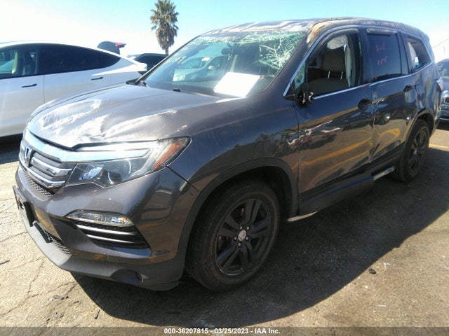 2018 HONDA PILOT LX VIN: 5FNYF5H10JB009005