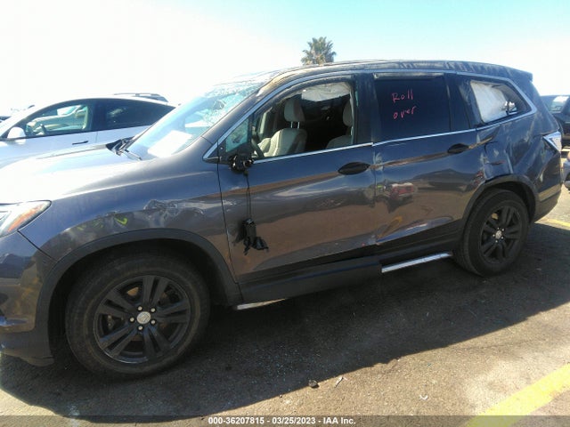 2018 HONDA PILOT LX VIN: 5FNYF5H10JB009005