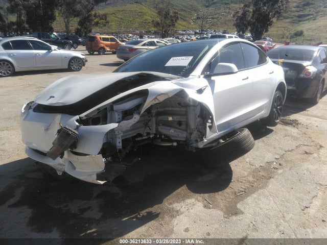 Tesla Model 3 Standard Range Plus 2021 5YJ3E1EA0MF939677 Image 2