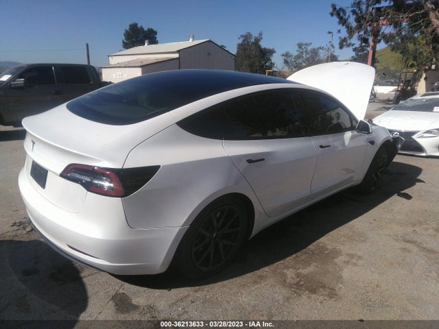 Tesla Model 3 Standard Range Plus 2021 5YJ3E1EA0MF939677 Image 4