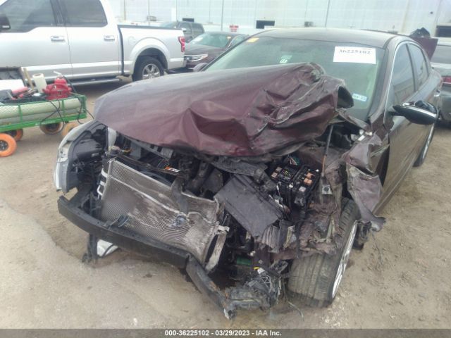5XXGT4L36GG117299 KIA Optima Lx