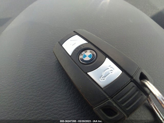 2014 BMW X1, VIN: WBAVM1C54EVW50920