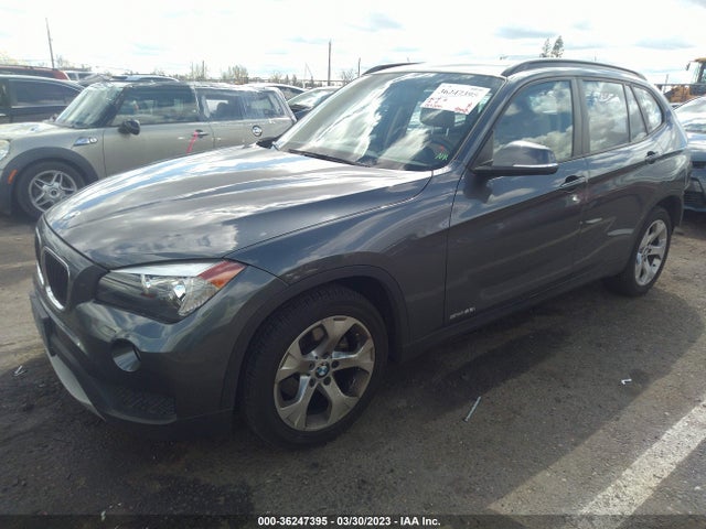2014 BMW X1, VIN: WBAVM1C54EVW50920