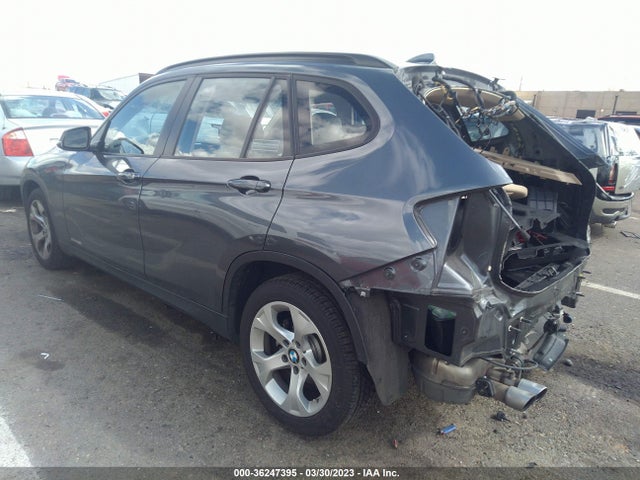2014 BMW X1, VIN: WBAVM1C54EVW50920