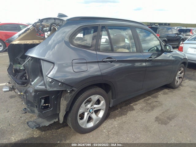 2014 BMW X1, VIN: WBAVM1C54EVW50920