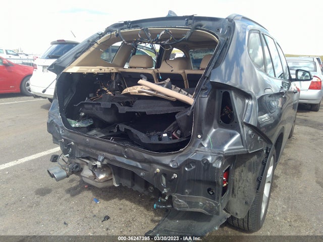 2014 BMW X1, VIN: WBAVM1C54EVW50920