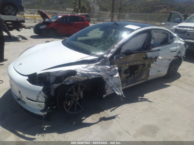5YJ3E1EA0MF999121 Tesla Model 3 Standard Range Plus