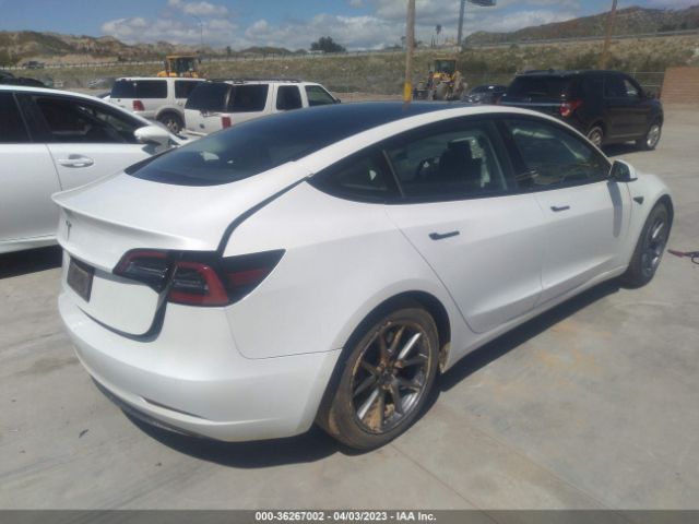 5YJ3E1EA0MF999121 Tesla Model 3 Standard Range Plus