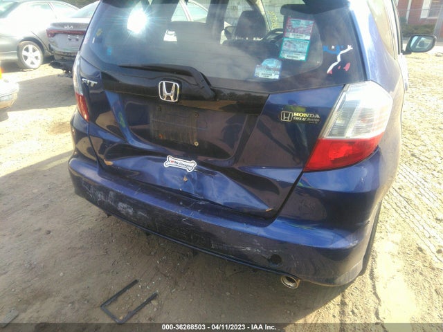2011 HONDA FIT SPORT VIN: JHMGE8H54BC020704