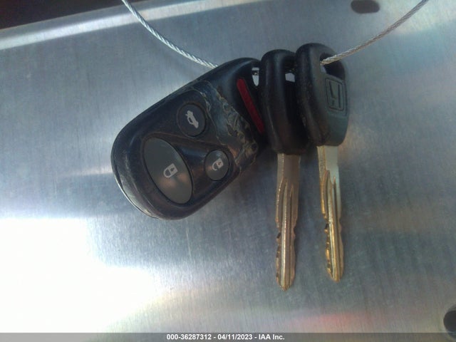 1999 HONDA ACCORD SDN EX VIN: 1HGCG1650XA067804