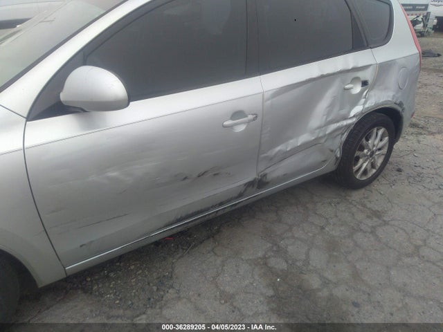 2009 HYUNDAI ELANTRA TOURING VIN: KMHDC86E99U038564