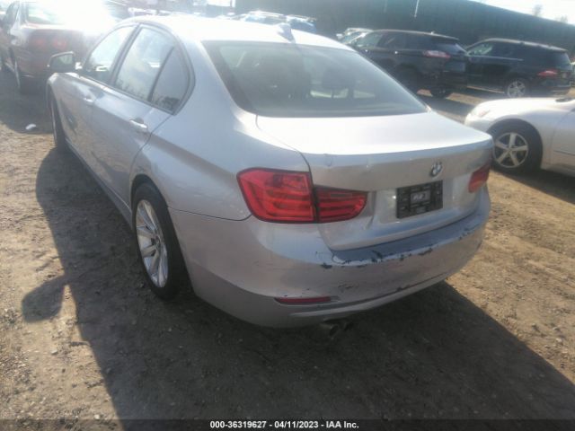 WBA3C1C5XEK106286 BMW 3 Series 328i