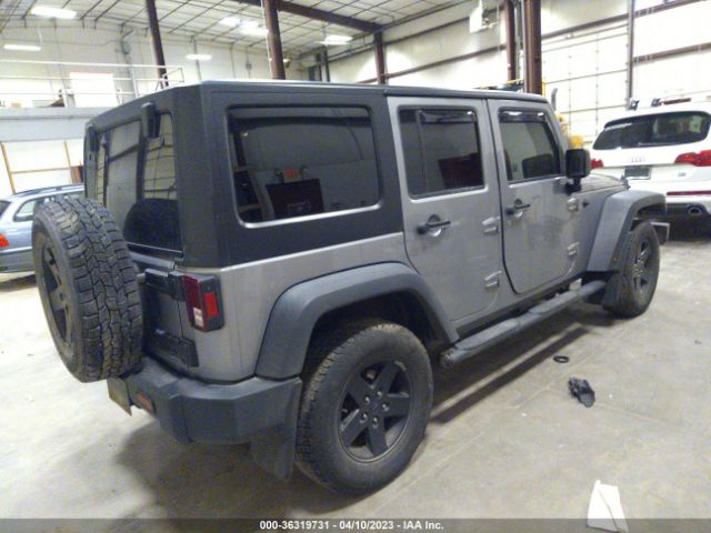 1C4BJWDG8EL207483 Jeep Wrangler Unlimited Sport
