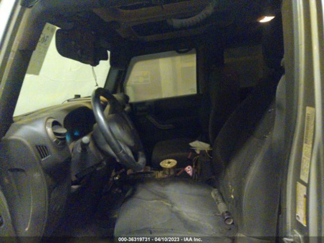 1C4BJWDG8EL207483 Jeep Wrangler Unlimited Sport