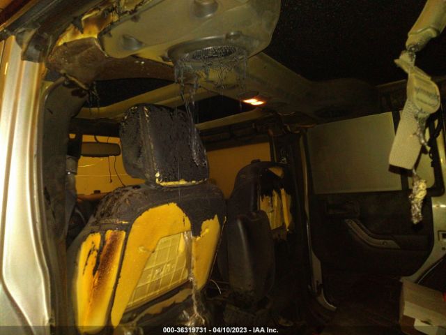 1C4BJWDG8EL207483 Jeep Wrangler Unlimited Sport